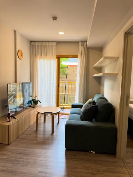 living room of THE BASE Sukhumvit 50
