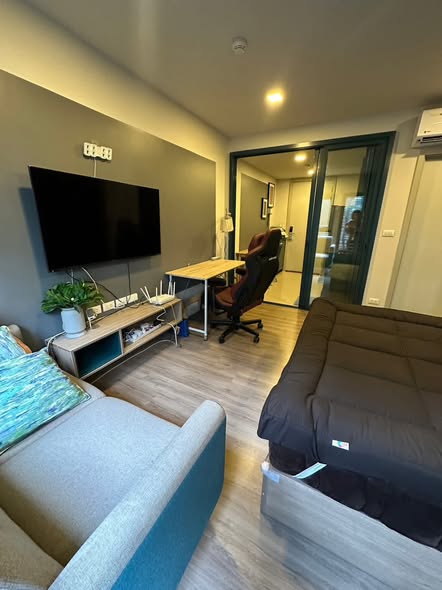 living room and bedroom of THE BASE Sukhumvit 50