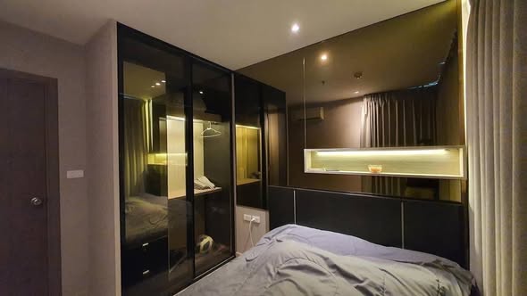 bedroom and room interior of THE BASE Sukhumvit 77