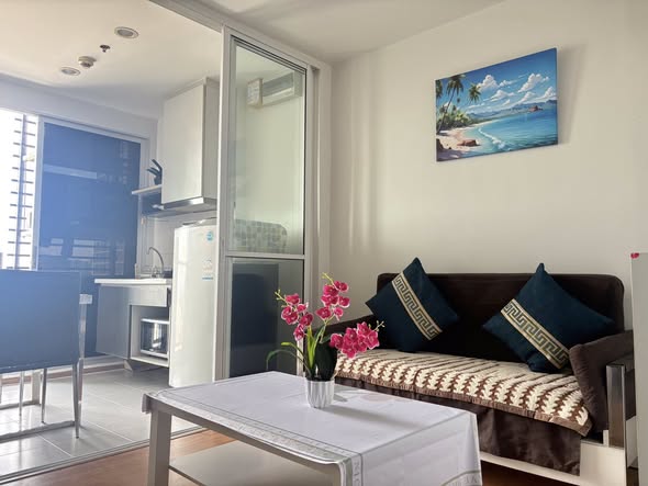 living room of THE BASE Sukhumvit 77