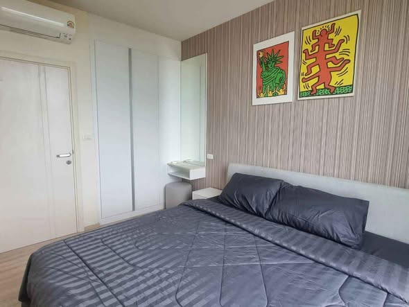 bedroom of The Base Uptown Condo
