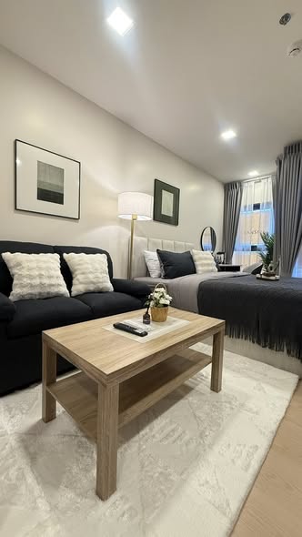 living room and bedroom of The Base Urban Rama9