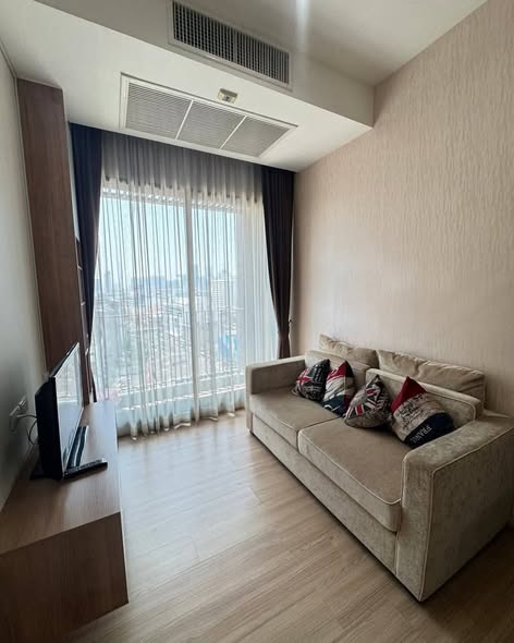 bedroom and living room of The Capital Condo Ekkamai-Thong Lo