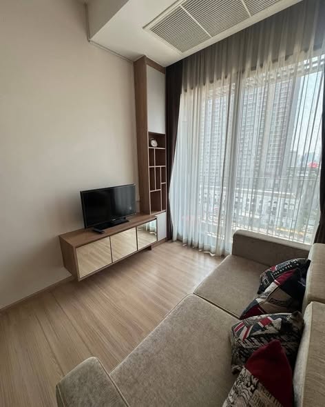 bedroom and living room of The Capital Condo Ekkamai-Thong Lo
