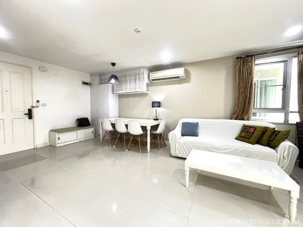 bedroom and living room of The Clover