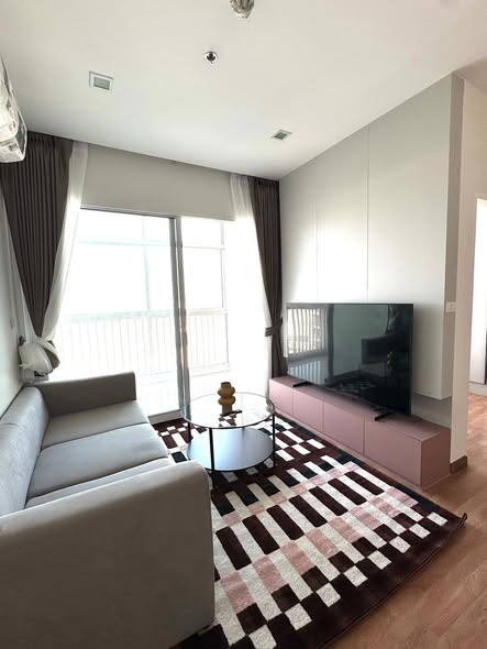 living room and bedroom of The Coast Bangkok