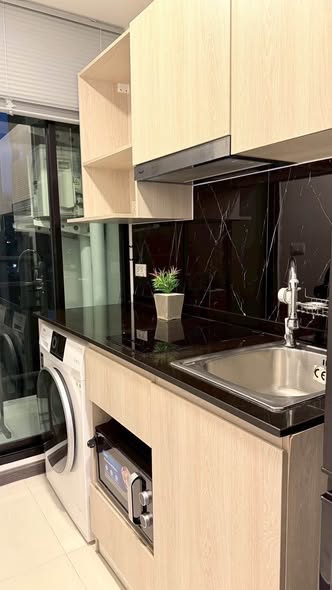 bathroom and kitchen of The Collect Ratchada 32
