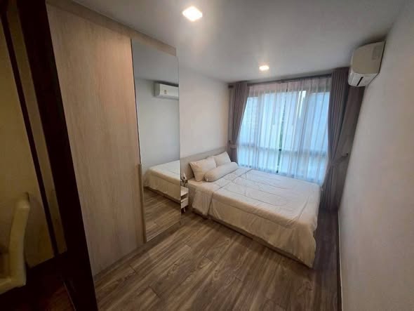 bedroom of The Collect Ratchada 32