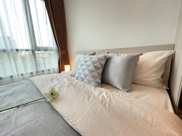 bedroom of The Collect Ratchada 32
