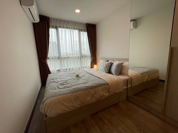 bedroom of The Collect Ratchada 32
