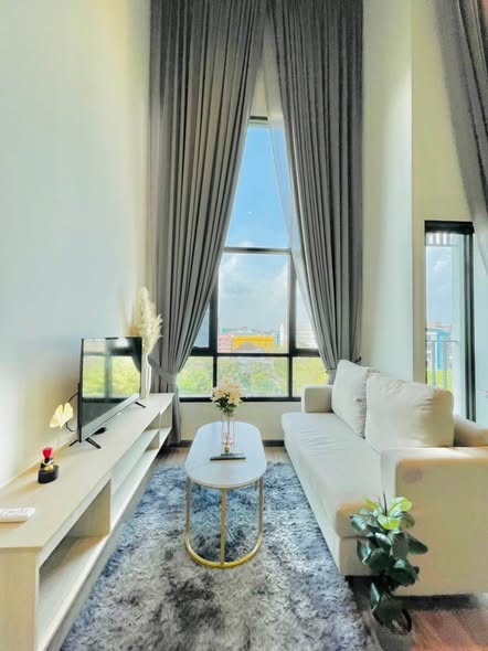 living room of The Collect Ratchada 32