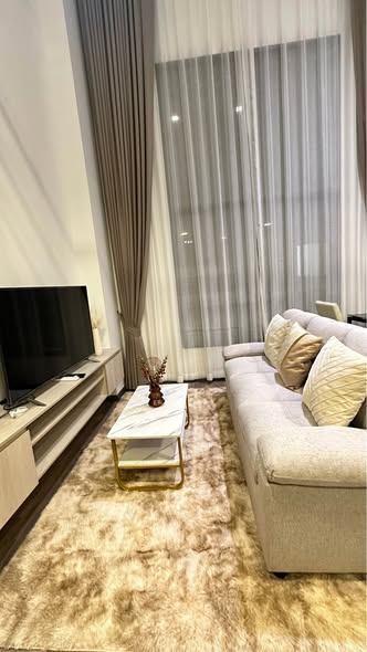 living room of The Collect Ratchada 32