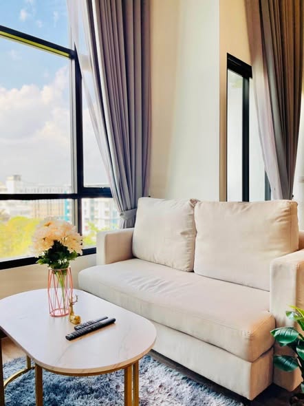 living room of The Collect Ratchada 32