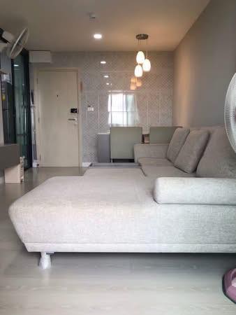 living room and bedroom of The Cube Station Ramintra109