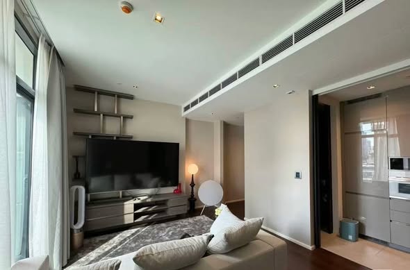 bedroom and living room of The Diplomat 39