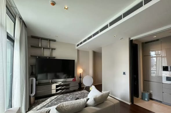 bedroom and living room of The Diplomat 39