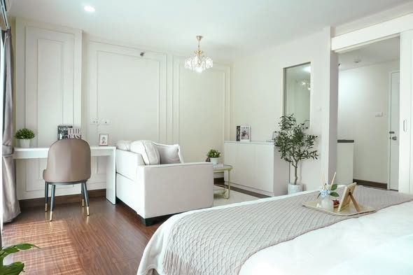 living room and bedroom of The Escape Condominium – ดิ เอสเคป คอนโดมิเนียม