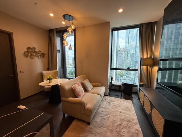 living room and bedroom of THE ESSE Sukhumvit 36