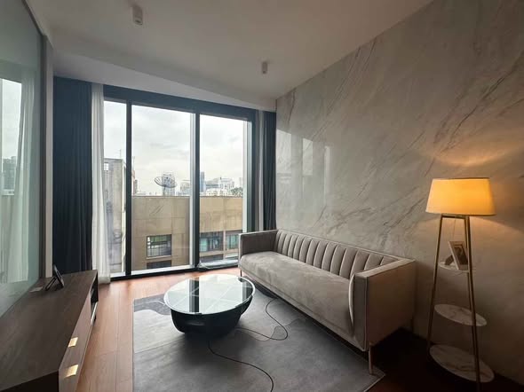 bedroom and living room of The Estelle Phrom Phong