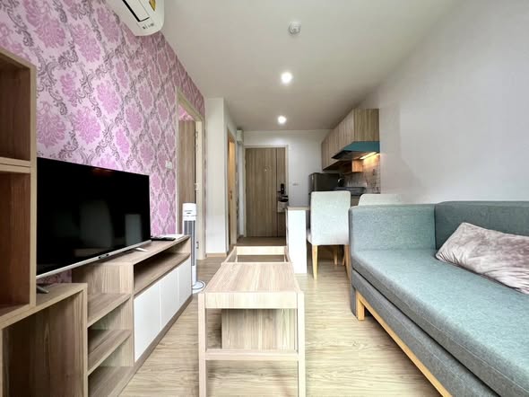 living room and bedroom of The Excel Hideaway Sukhumvit 50