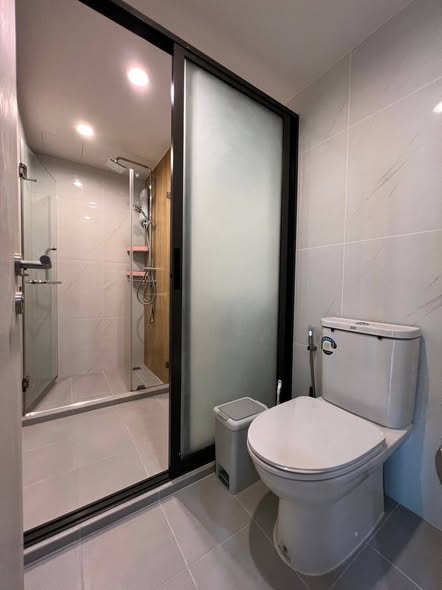 room interior and bathroom of The Excel Hideaway Sukhumvit 50