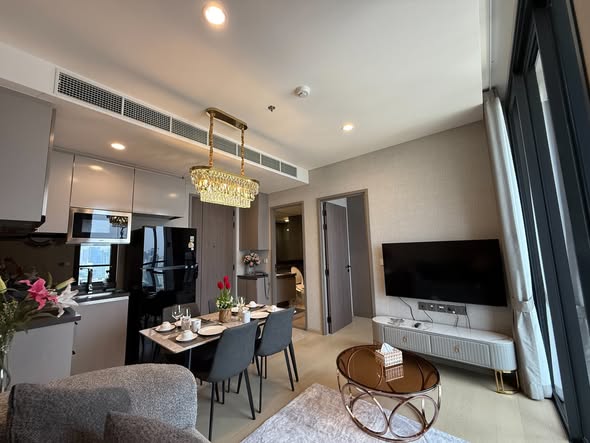 bedroom and living room of THE EXTRO Phayathai-Rangnam