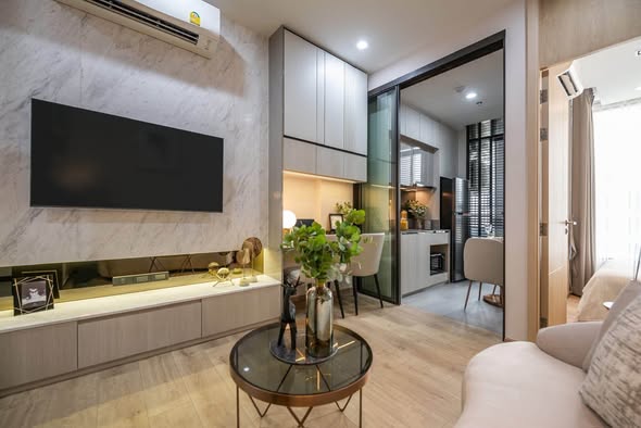 bedroom and living room of The Fine Bangkok