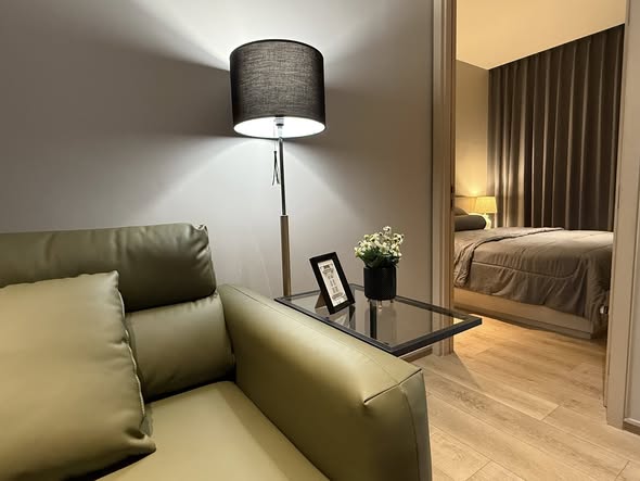 living room and bedroom of The Fine Bangkok