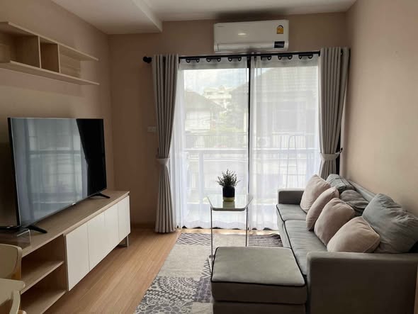living room and bedroom of The Fore Condominium