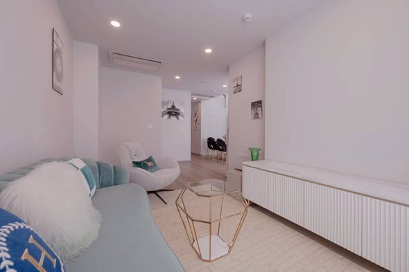 bedroom and living room of The Forestias by MQDC