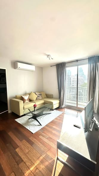 bedroom and living room of The Fortynine Plus 2