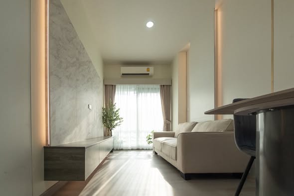 bedroom and living room of The Fourwings Residence