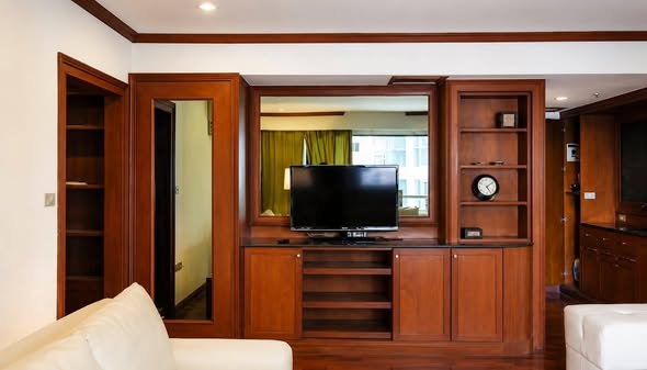 bedroom and living room of The Grand