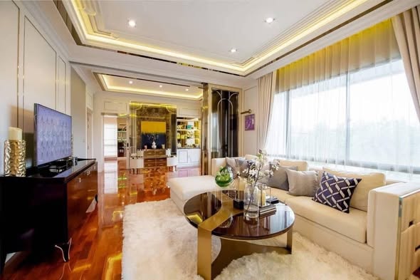 living room and bedroom of เดอะ แกรนด์ ลักซ์ บางนา-สวนหลวง THE GRAND LUX BANGNA- SUANLUANG