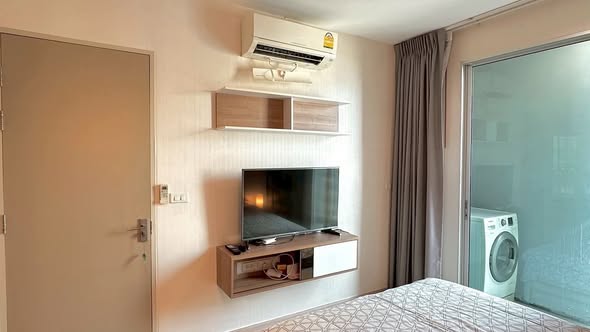 bedroom of The Hotel Serviced Condo เดอะโฮเทล คอนโด