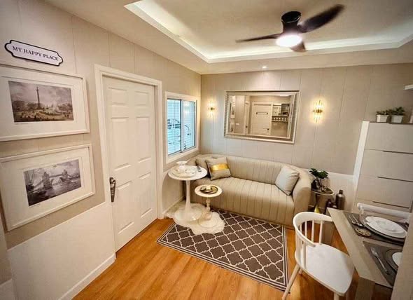 bedroom and living room of The Kris Express 2
