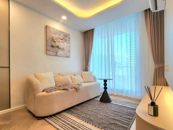 bedroom and living room of The Kris Extra 4