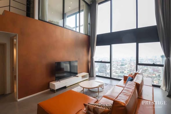 bedroom and living room of The Lofts Silom by Raimon Land
