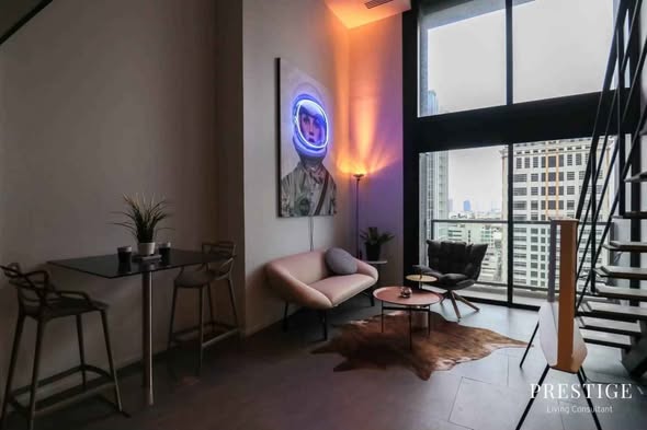 living room of The Lofts Silom by Raimon Land