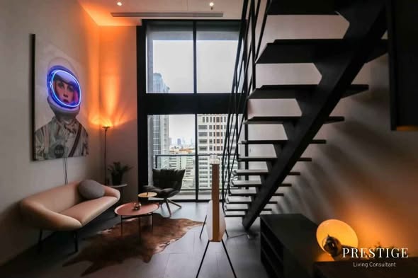 living room of The Lofts Silom by Raimon Land