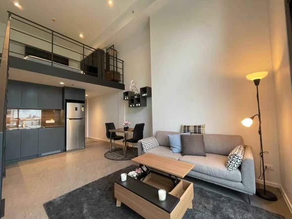 living room of The Lofts Silom by Raimon Land