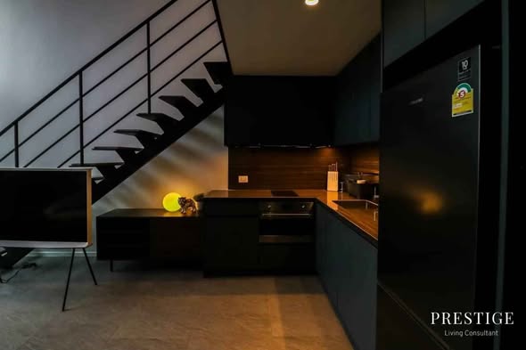 living room of The Lofts Silom by Raimon Land