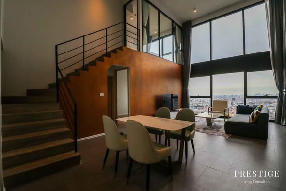 living room and room interior of The Lofts Silom by Raimon Land