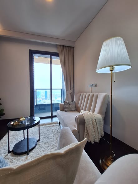 bedroom and living room of The Lumpini 24