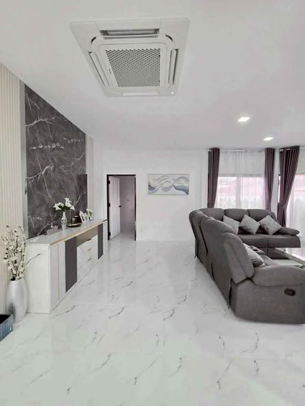 living room and kitchen of The M Pool Villas Bangkok – Ekkamai