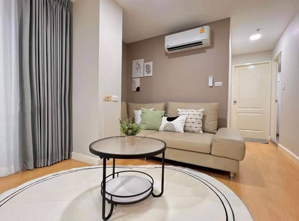 bedroom and living room of The Master Sathon Executive