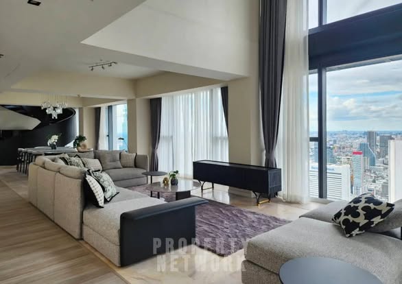 bedroom and living room of The Met Condominium