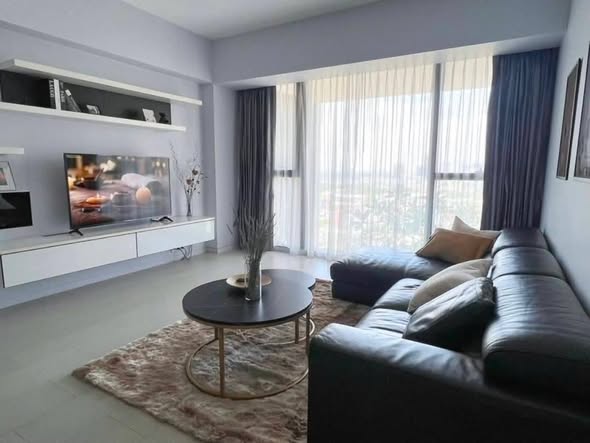living room and bedroom of The Met Condominium