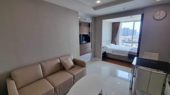 bedroom of The Metropolis Samrong