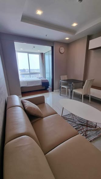 bedroom of The Metropolis Samrong